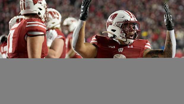 Braelon Allen TD celebration OT 2023 Nebraska vs Wisconsin football USATSI_21932757